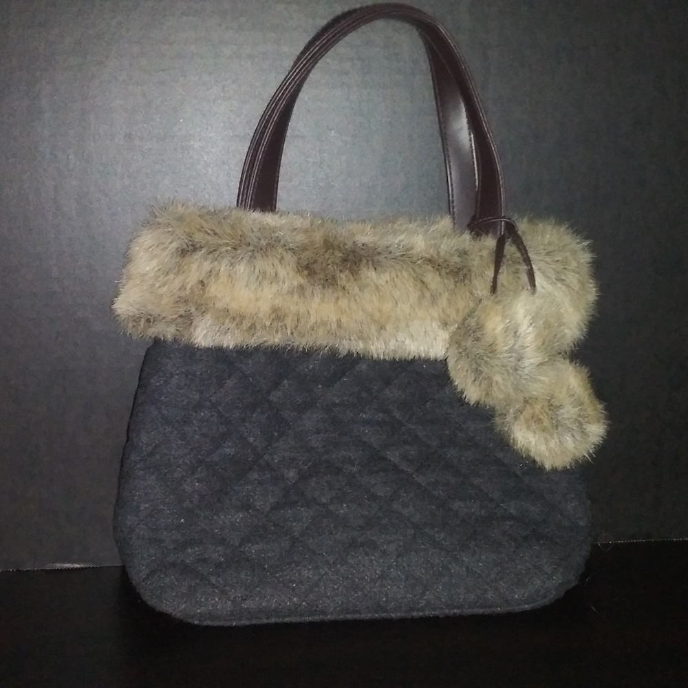 Small tan and black handbag